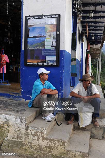 Typical Paisa man in main square, watches the Salento festival. The Paisas are a people who inhabit a region over the northwest Colombia in the...