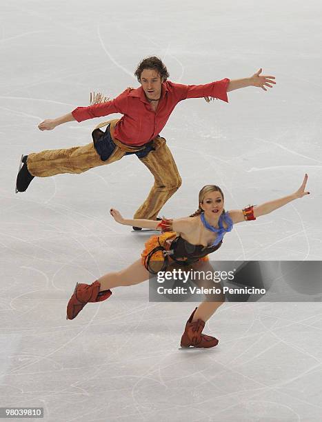 Nathalie Pechalat and Fabian Bourzat of France compete in the Ice Dance Original Dance during the 2010 ISU World Figure Skating Championships on...