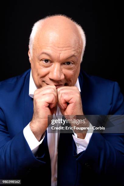 Writer Eric-Emmanuel Schmitt poses during a portrait session in Paris, France on .