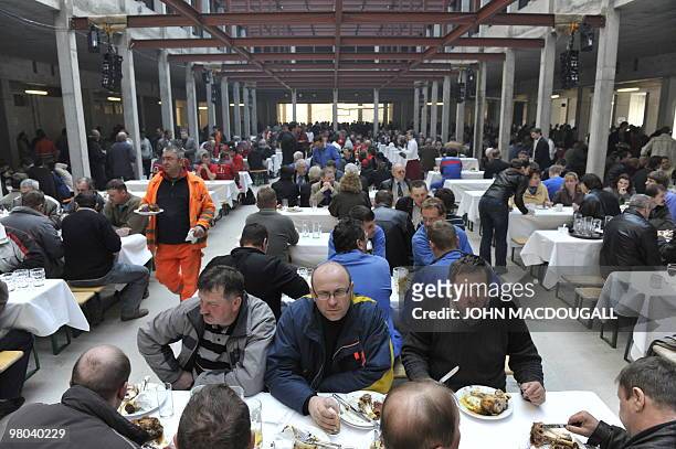 Workers take part in a banquet during a topping-out ceremony for the new German Intelligence service building March 25, 2010 in Berlin. The new...