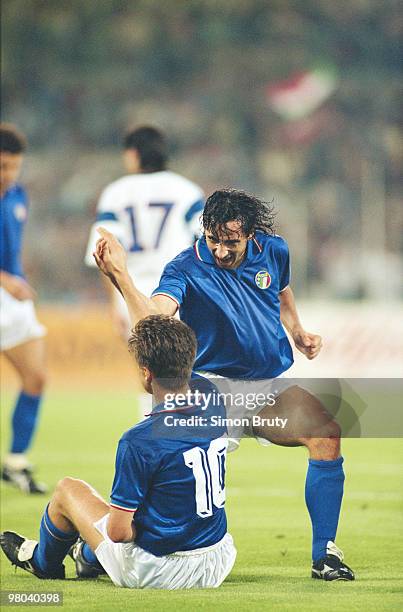 Andrea Carnevale of Italy celebrates with Nicola Berti during their Group A match against Austria during the 1990 FIFA World Cup on 9 June 1990 at...