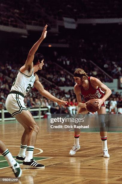 Bill Walton of the Portland Trail Blazers looks to make a move against the Boston Celtics during a game played in 1977 at the Boston Garden in...