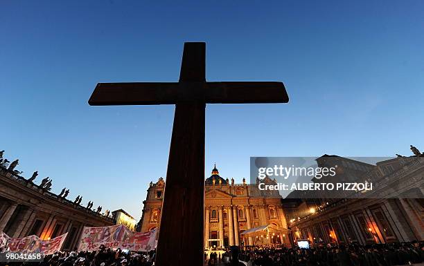 Giant cross is seen in St.Peters square at the Vatican on March 25 2010, before the arrival of Pope Benedict XVI for a meeting with the youth of Rome...