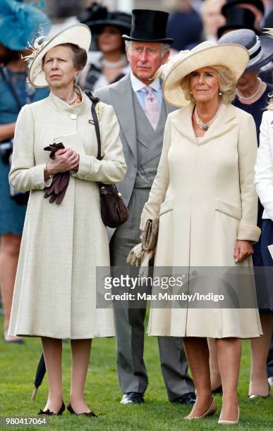 Princess Anne, Princess Royal, Prince Charles, Prince of Wales and Camilla, Duchess of Cornwall watch The Queen's horse 'Fabricate' run in the...