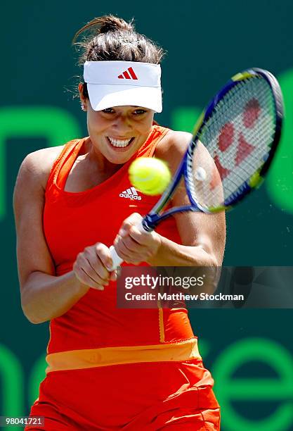 Ana Ivanovic of Serbia returns a shot against Pauline Parmentier of France during day three of the 2010 Sony Ericsson Open at Crandon Park Tennis...