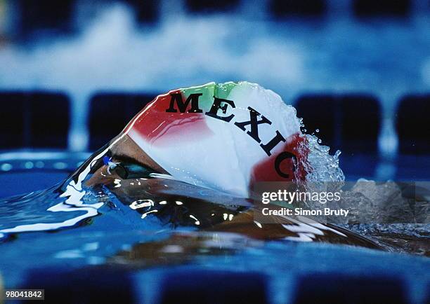 Jose Inesto of Mexico creates a bubble as he breaks the water surface during the 200 m individual medley on 13 August 1995 at the 6th Pan Pacific...