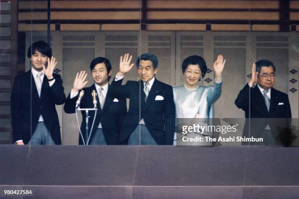 Prince Fumihito, Prince Naruito, Crown Prince Akihito, Crown Princess Michiko and Prince Hitachi wave to well-wishers from a balcony at the Imperial...