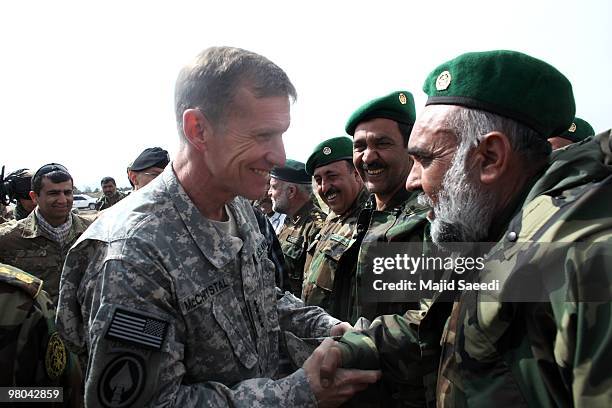 General Stanley A. McChrystal, Commander, U.S. Forces Afghanistan inspects an Afghan National Army guard of honor during a ceremony on March 25, 2010...