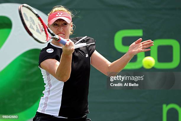 Elena Baltacha of Great Britain returns a shot against Yanina Wickmayer of Belgium during day three of the 2010 Sony Ericsson Open at Crandon Park...