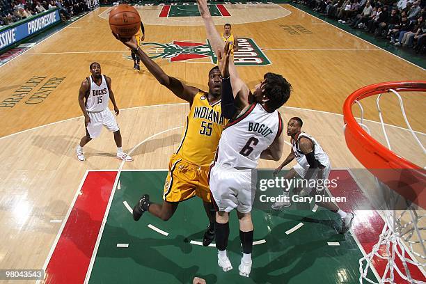 Roy Hibbert of the Indiana Pacers shoots a layup against Andrew Bogut of the Milwaukee Bucks during the game at the Bradley Center on March 14, 2010...