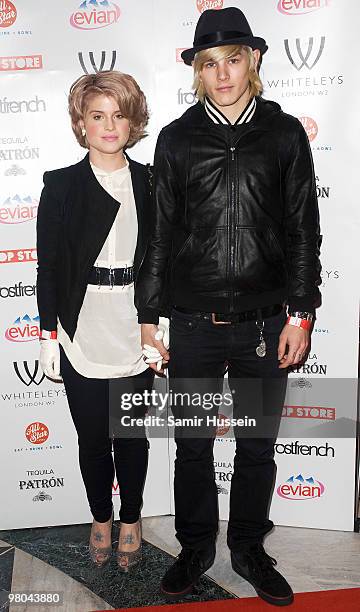 Kelly Osbourne and boyfriend Luke Worrall arrive at the Pop-Up Store launch party at Whiteleys on March 25, 2010 in London, England.