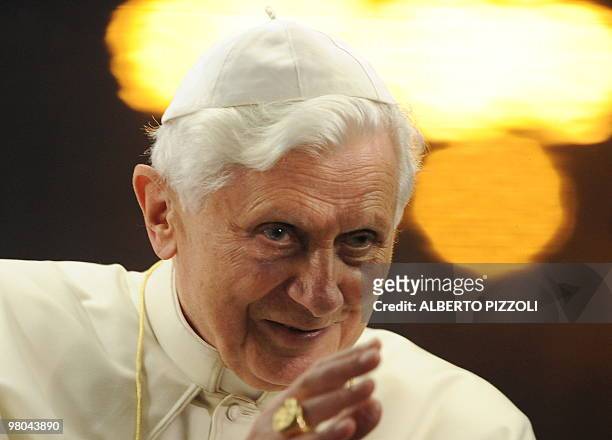 Pope Benedict XVI salutes as arrives to lead the meeting with the youth of Rome and the Lazio region in preparation for World Youth Day in St.Peters...