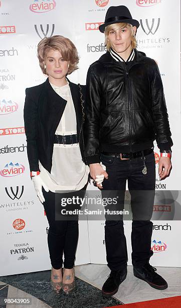Kelly Osbourne and boyfriend Luke Worrall arrive at the Pop-Up Store launch party at Whiteleys on March 25, 2010 in London, England.