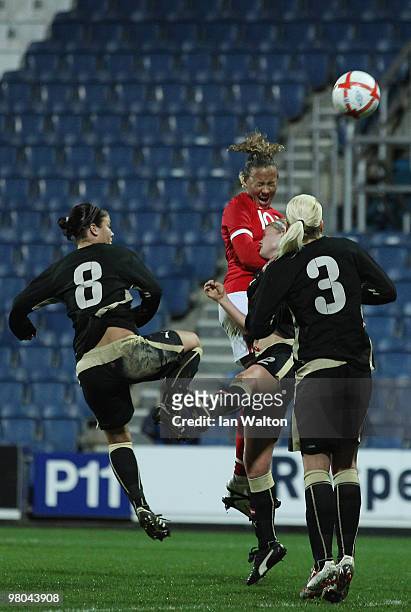 Lianne Sanderson of England heads to score the first goal during the Womens World Cup Qualifier between England and Austria at Loftus Road on March...