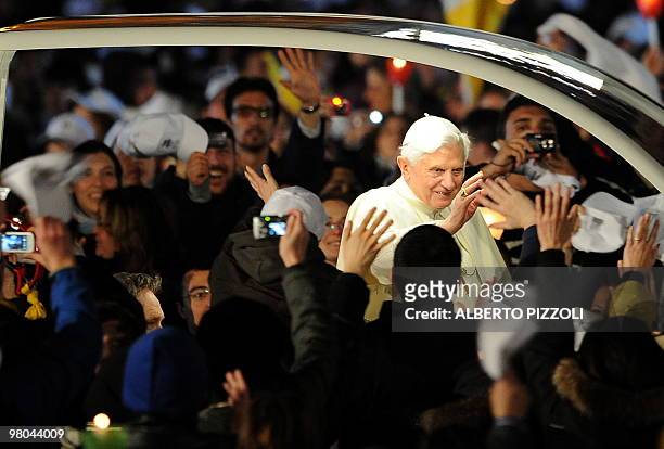Pope Benedict XVI salutes as he arrives to lead the meeting with the youth of Rome and the Lazio region in preparation for World Youth Day in...