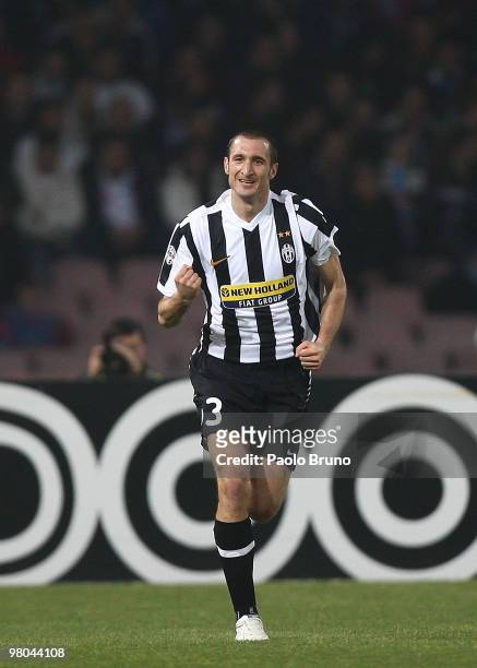 Giorgio Chiellini of Juventus FC celebrates scoring the opening goal during the Serie A match between SSC Napoli and Juventus FC at Stadio San Paolo...