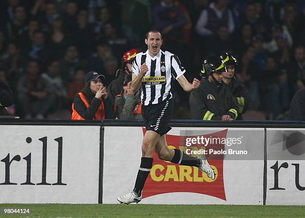 Giorgio Chiellini of Juventus FC celebrates scoring the opening goal during the Serie A match between SSC Napoli and Juventus FC at Stadio San Paolo...