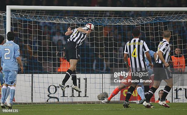 Giorgio Chiellini of SSC Napoli scores the opening goal during the Serie A match between SSC Napoli and Juventus FC at Stadio San Paolo on March 25,...