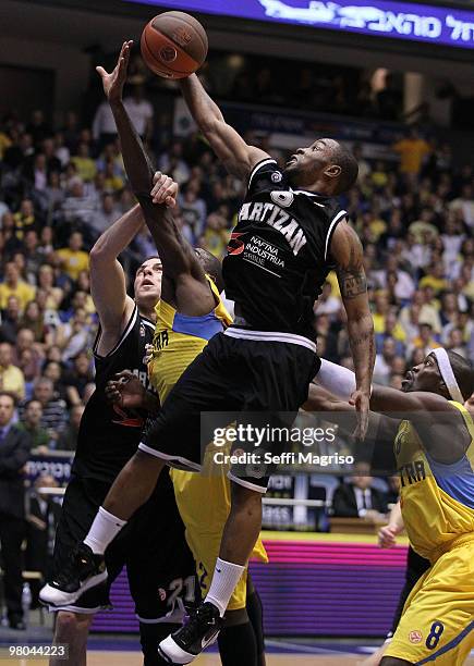 Lester McCalebb, #6 of Partizan Belgrade competes with Doron Perkins, #8 of Maccabi Electra Tel Aviv in action during the Euroleague Basketball...