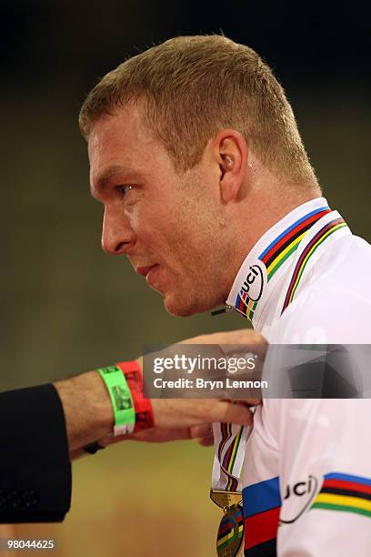 Sir Chris Hoy of Great Britain receives his gold medal after winning the Men's Keirin on Day Two of the UCI Track Cycling World Championships at the...