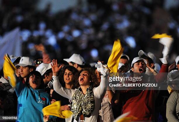 Youths greet Pope Benedict XVI as he arrives to lead the meeting with the youth of Rome and the Lazio region in preparation for World Youth Day in...