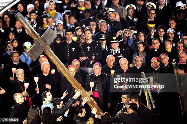 Group of Catholic youths carry the cross during a meeting beetween Pope Benedict XVI and the youth of Rome and the Lazio region in preparation for...