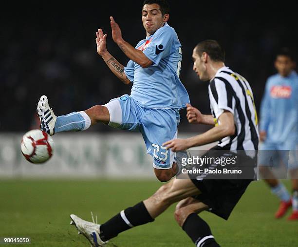 Giorgio Chiellini of Juventus FC and Walter Gargano of SSC Napoli in action during the Serie A match between SSC Napoli and Juventus FC at Stadio San...