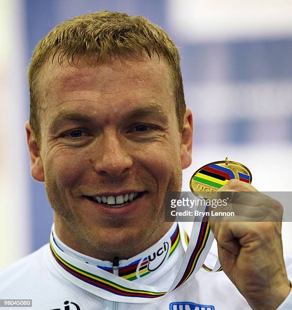 Sir Chris Hoy of Great Britain poses with his gold medal after winning the Men's Keirin on Day Two of the UCI Track Cycling World Championships at...