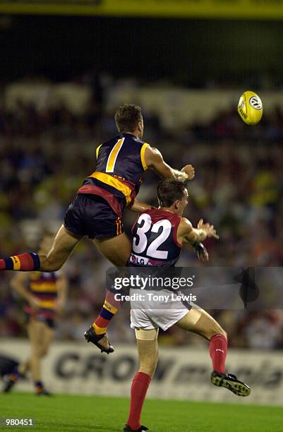 Andrew Crowell for Adelaide and Cmaeron Bruce for Melbourne contest a mark in the match between the Adelaide Crows and the Melbourne Demons in round...