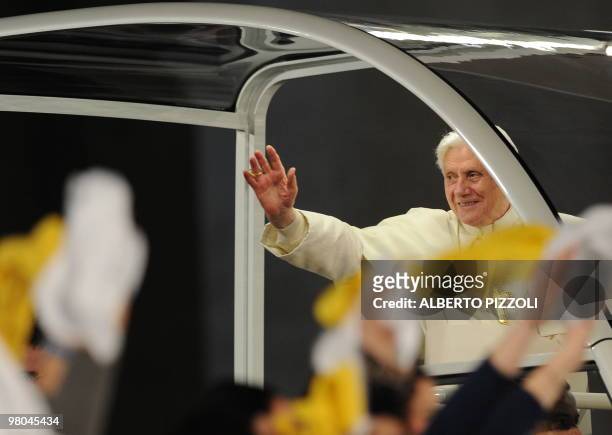 Pope Benedict XVI salutes at the end of the meeting with the youth of Rome and the Lazio region in preparation for World Youth Day in St.Peters...