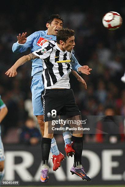 Claudio Marchisio of Juventus FC and Michele Pazienza of SSC Napoli in action during the Serie A match between SSC Napoli and Juventus FC at Stadio...