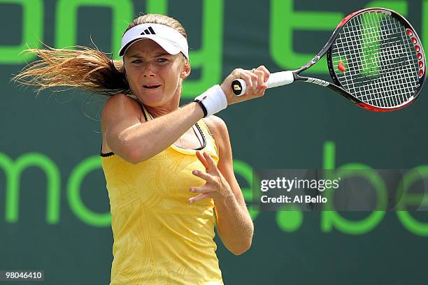Daniela Hantuchova of Slovakia returns a shot against Patty Schnyder of Switzerland during day three of the 2010 Sony Ericsson Open at Crandon Park...
