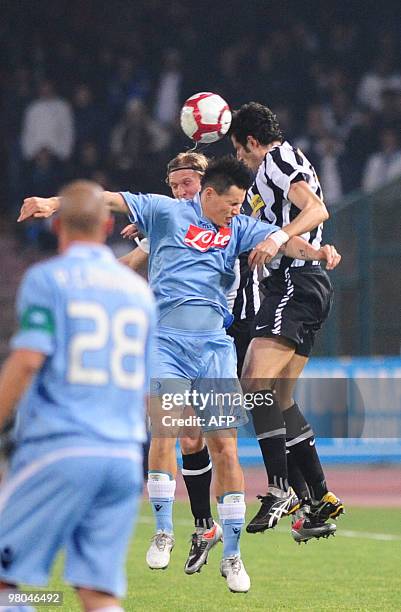 Juventus midfielderFabio Grosso vies for the ball with SSC Napoli Marek Hamsik during their football Serie A Match SSC Napoli vs FC Juventus in San...