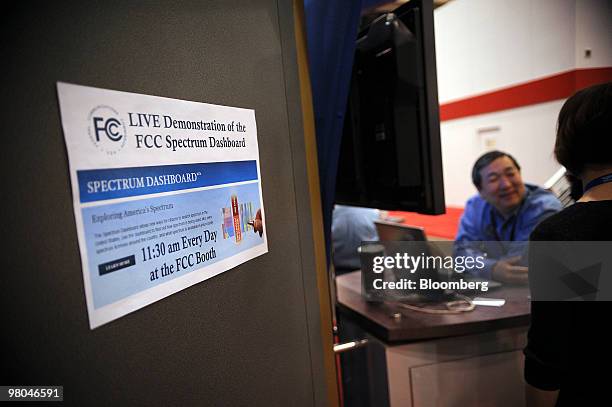 Sign at the U.S. Federal Communications Commission booth advertises a demonstration of the FCC spectrum dashboard at the CTIA Wireless conference in...