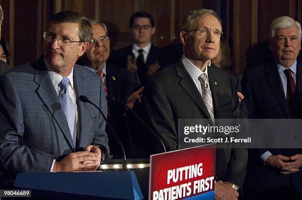 Senate Budget Chairman Kent Conrad, D-N.D., Sen. Robert Menendez, D-N.J., Senate Majority Leader Harry Reid, D-Nev., and Sen. Christopher J. Dodd,...