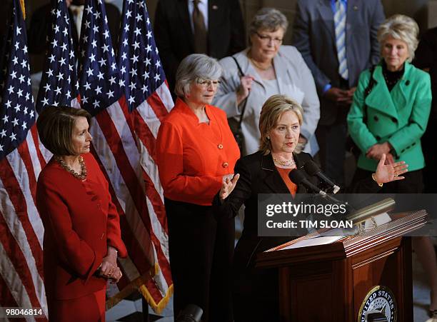 Speaker of the House Nancy Pelosi hosts a Women's History Month Celebration in honor of Secretary of State Hillary Clinton with Rep. Lynn Woolsey...