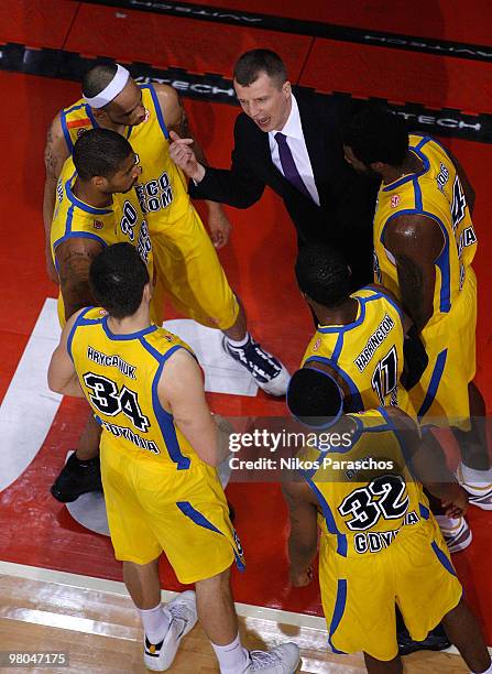 Tomas Pacesas, Head Coach of Asseco Prokom Gdynia gives directions to his players during the Euroleague Basketball 2009-2010 Play Off Game 2 between...