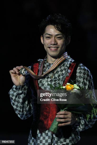 Daisuke Takahashi of Japan poses with his Gold medal after the Men's Free Skate during the 2010 ISU World Figure Skating Championships on March 25,...