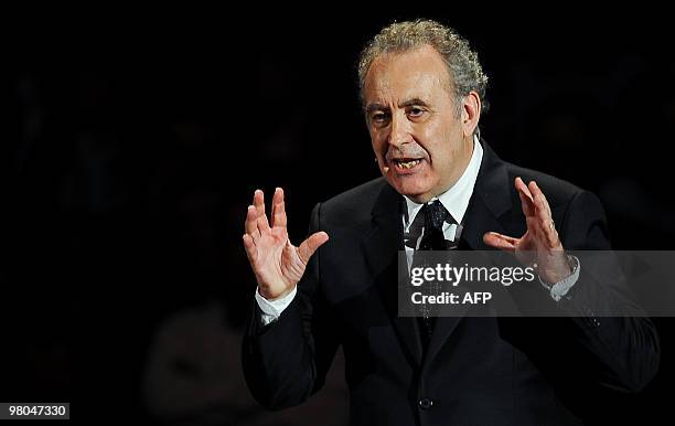 Italian TV host and journalist Michele Santoro speaks during his talk show " RAI per una notte " , at Paladozza sport hall, in Bologna, on March 25,...