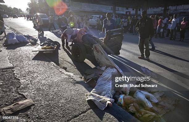 Bodies are piled up on the streets on January 14, 2010 in Port au Prince, Haiti. As the world rallies to help, emergency efforts try and make way to...