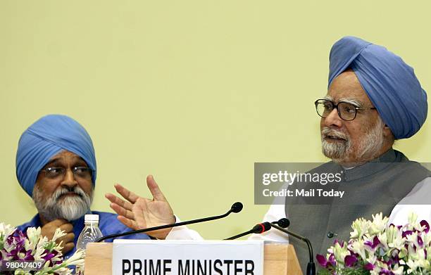Prime Minister Manmohan Singh addresses delegates at a conference entitled 'Building Infrastructure Challenges and Opportunities' in New Delhi on...