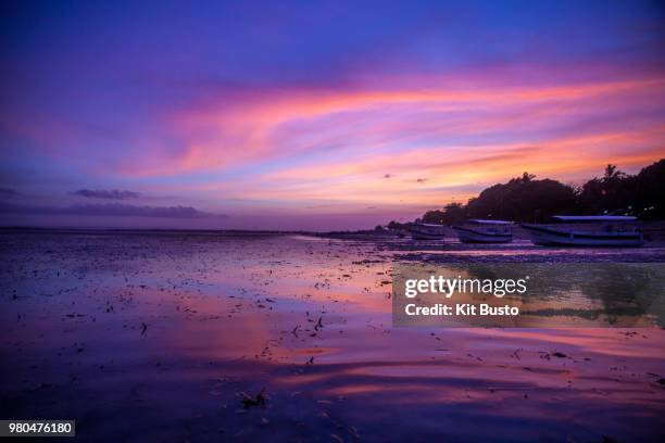 sunset in sanur - busto stock pictures, royalty-free photos & images