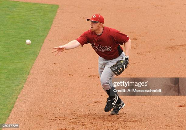 Infielder Chris Shelton of the Houston Astros starts a first base put out against the Philadelphia Phillies March 25, 2010 at Bright House Field in...