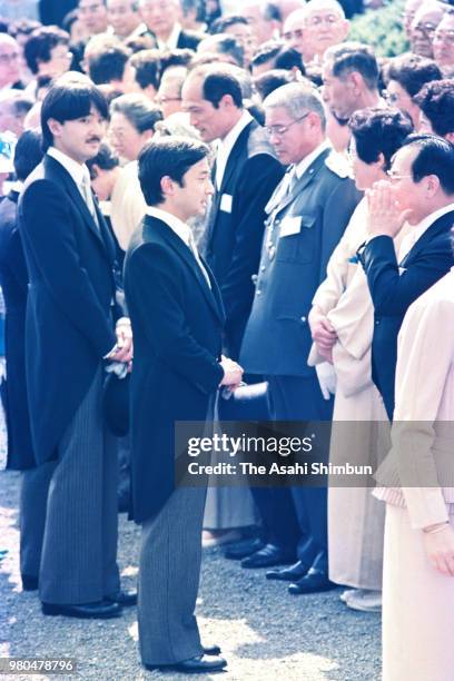 Prince Naruhito talks singer Haruo Minami during the spring garden party at the Akasaka Imperial Garden on May 20, 1987 in Tokyo, Japan.