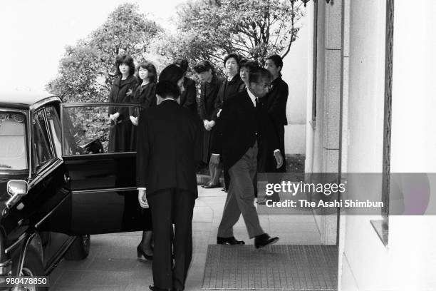 Prince Mikasa and Princess Yuriko of Mikasa are seen on arrival at the residence of late Prince Takamatsu for the 100 days memorial ceremony of his...