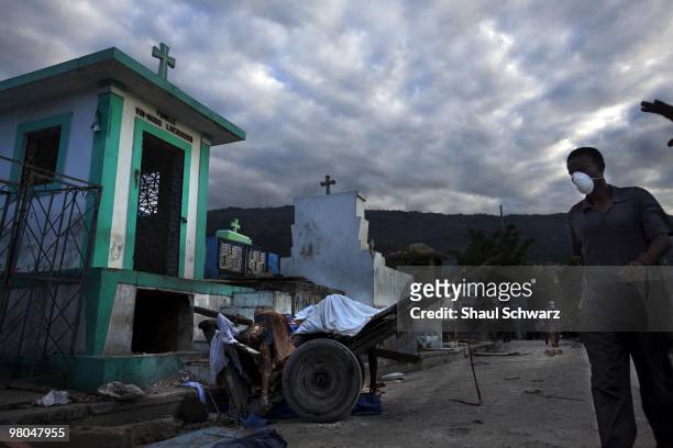 Dead body lays on the street on January 14, 2010 in Port au Prince, Haiti. As the world rallies to help, emergency efforts try and make way to the...