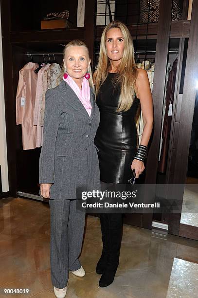 Barbara Bouchet and Tiziana Rocca attend the opening of the ''Ester Maria Rivaroli'' flagship store on March 25, 2010 in Rome, Italy.