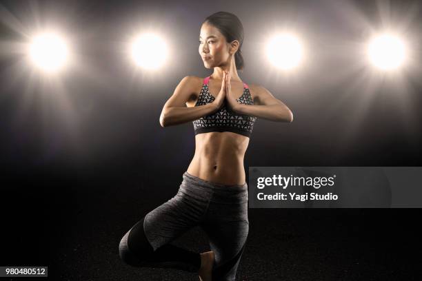 fitness woman doing yoga - athlete bulges stock pictures, royalty-free photos & images
