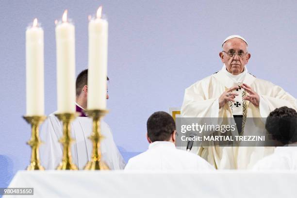 Pope Francis celebrates a mass during his one-day visit at the invitation of the World Council of Churches on June 21, 2018 in Palexpo hall inGeneva....