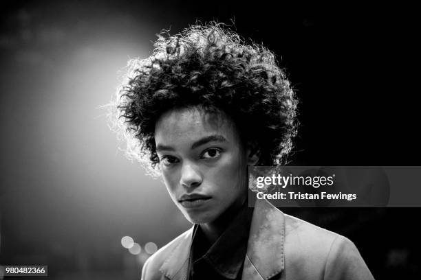 Model poses backstage prior to the AMI Menswear Spring Summer 2019 show as part of Paris Fashion Week on June 21, 2018 in Paris, France.
